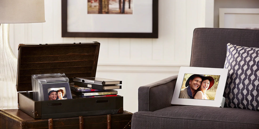 Digital photo frame and old family photos, a sentimental gift idea for parents.