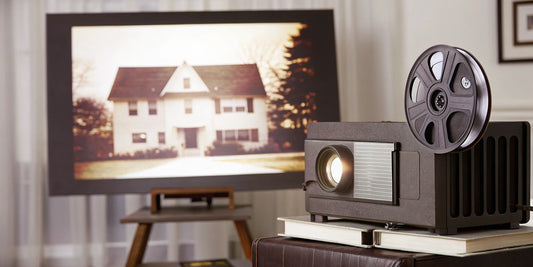 Old home videos on vintage film projector.