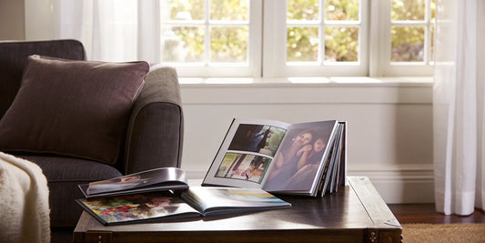 A variety of scrapbook albums with different covers and bindings for protecting memories.