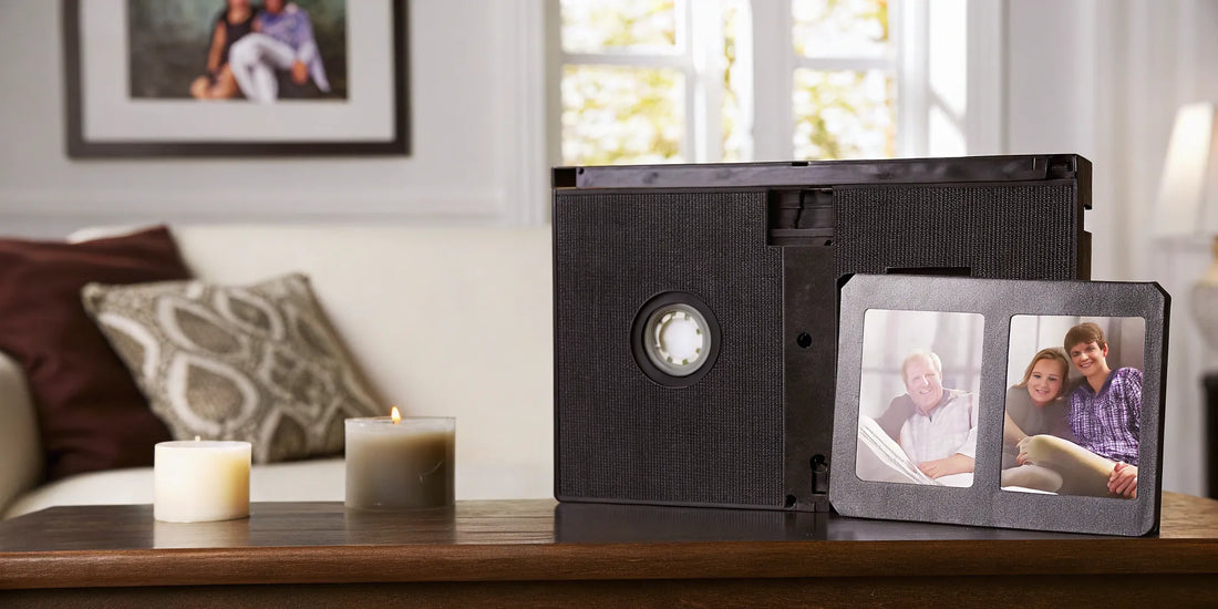 An old VHS tape and family photos, posing the question of how long VHS tapes last.