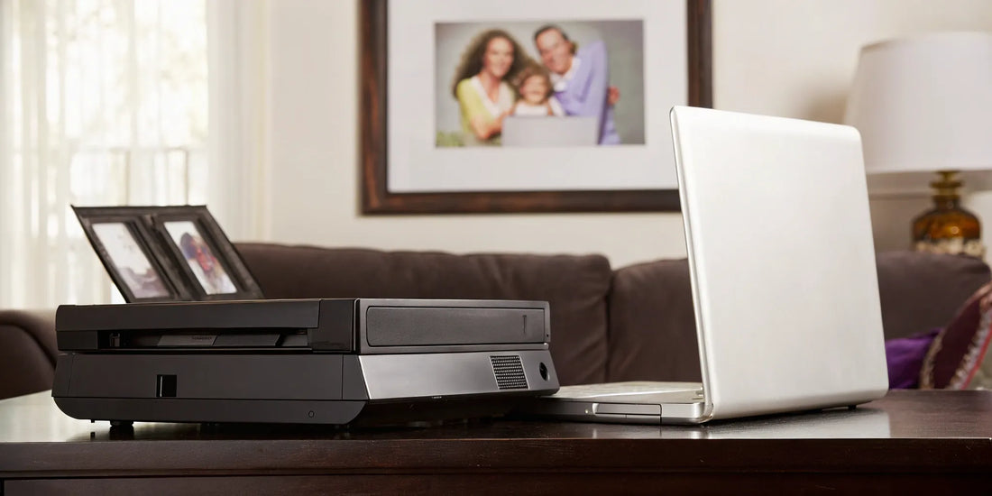 Convert VHS tapes to digital using a laptop and VCR.