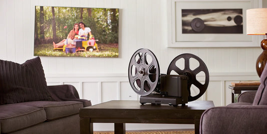 Editing digitized home movies on a vintage film projector.