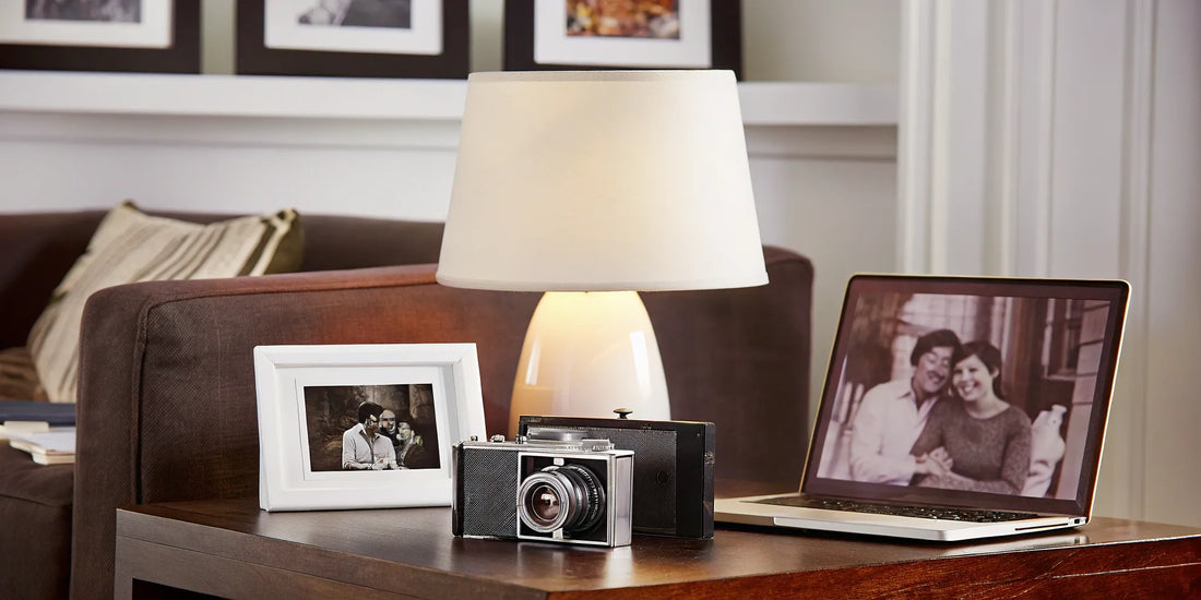 Photo scanning service digitizing pictures on a laptop.