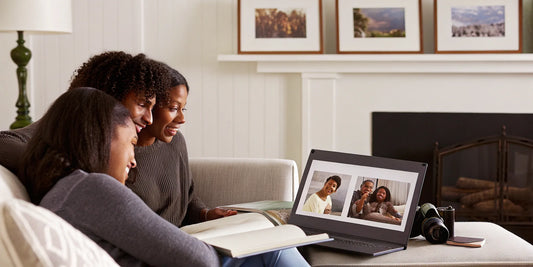 Family sharing digitized photos and videos online.