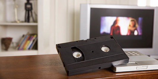 A VCR and VHS tape setup used to transfer VHS to a computer.